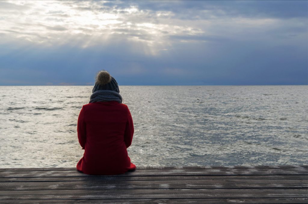 Lonely Person by the sea