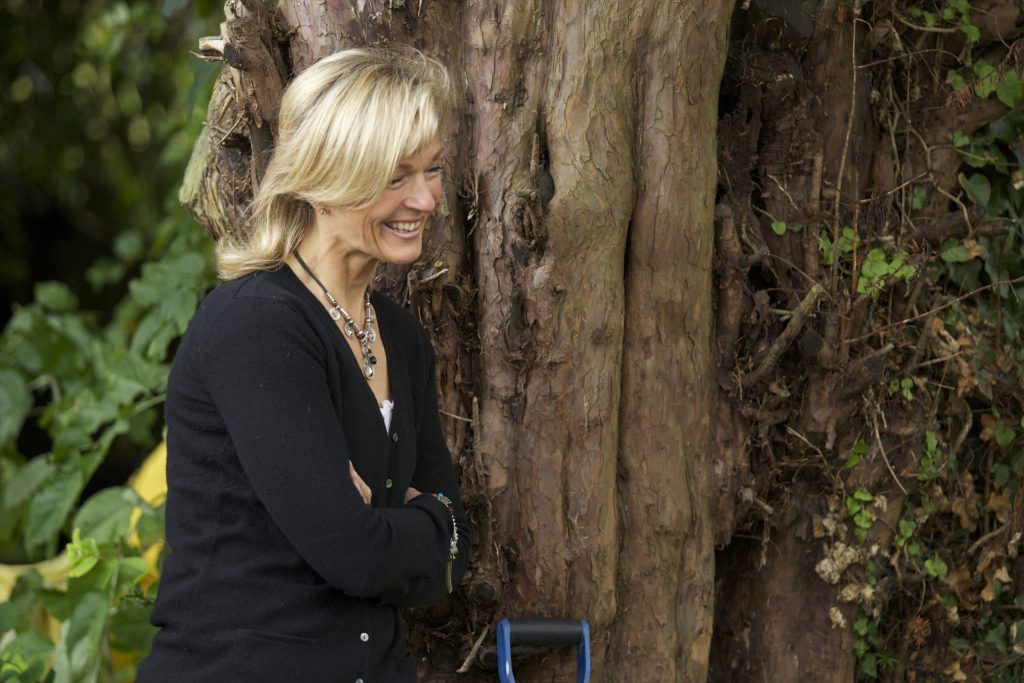 carolne cary by a tree
